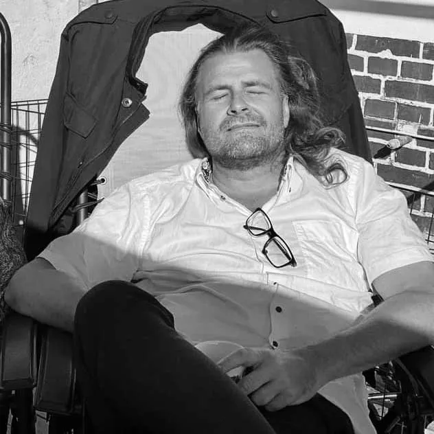 Gent staring thoughtfully, contemplating complex philosophical themes